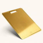 Tabla de cortar de titanio dorado para una preparación elegante