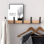 Porte-manteau mural mobile pour des entrées artistiques