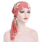 Turban floral pré-noué pour un style sans effort  